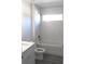 Bathroom with white subway tile, modern fixtures, and a bathtub at 13441 Sw 113Th Pl, Dunnellon, FL 34432