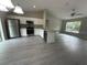 Modern kitchen featuring stainless steel appliances, white cabinets, and an eat-in island at 15923 Sw 41St Street Rd, Ocala, FL 34481