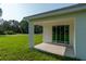 Covered back porch providing an outdoor living space with green views at 3649 Sw 177Th Lane Rd, Ocala, FL 34473