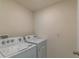 Practical laundry room featuring a full-size, side-by-side, washer and dryer at 3649 Sw 177Th Lane Rd, Ocala, FL 34473