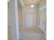 Bright entryway with tile flooring, double doors, and high ceilings at 7695 Sw 103Rd Loop, Ocala, FL 34476