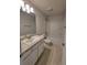 Bathroom with granite countertops and a shower/tub combo at 7703 Sw 103Rd Loop, Ocala, FL 34476