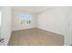 Bright and airy bedroom with wood-look flooring at 9769 Sw 79Th Lane Rd, Ocala, FL 34481