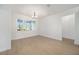 Bright dining room with wood-look floors and large window at 9769 Sw 79Th Lane Rd, Ocala, FL 34481