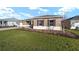 Side view of the house, showcasing the landscaping at 9769 Sw 79Th Lane Rd, Ocala, FL 34481