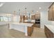 Modern kitchen with island, stainless steel appliances, and light wood cabinets at 9769 Sw 79Th Lane Rd, Ocala, FL 34481