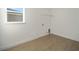 Laundry room with window and wood-look floors at 9769 Sw 79Th Lane Rd, Ocala, FL 34481