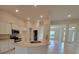 Open kitchen featuring granite countertops, stainless steel appliances, and breakfast bar at 11503 Sw 65Th Avenue Rd, Ocala, FL 34476