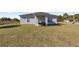 View of backyard with patio and grassy area at 12803 Sw 73Rd Ter, Ocala, FL 34473