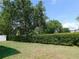 Well-manicured backyard with privacy hedge is a great place to play and relax outdoors at 4085 Sw 49Th Ave, Ocala, FL 34474