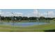 Community basketball court featuring bright blue and green colors with visible hoops at 4085 Sw 49Th Ave, Ocala, FL 34474