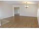 This cozy living area includes hardwood floors and neutral walls for a relaxing space at 4085 Sw 49Th Ave, Ocala, FL 34474