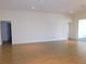 Bright living room featuring wood floors and sliding glass doors leading to a lanai at 4085 Sw 49Th Ave, Ocala, FL 34474