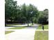 A community street with well-maintained trees and sidewalks at 4085 Sw 49Th Ave, Ocala, FL 34474