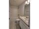 Bright bathroom featuring a shower-tub combo, a toilet, and a single vanity at 7613 Sw 103Rd Loop, Ocala, FL 34476