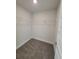 A walk-in closet with carpet and wire shelving provides ample storage at 7613 Sw 103Rd Loop, Ocala, FL 34476