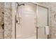 Updated shower with tiled walls and built-in shelving at 8718 Sw 83Rd Loop, Ocala, FL 34481