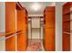 Large walk-in closet with ample shelving and hanging space at 8718 Sw 83Rd Loop, Ocala, FL 34481