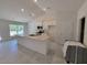 Bright kitchen has new stainless appliances, granite counters, and recessed lighting at 9679 Sw 46Th Ct, Ocala, FL 34476