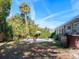 View of pool and hot tub from the backyard at 11520 Se 54Th Ave, Belleview, FL 34420