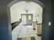 View of a kitchen with white cabinetry and modern backsplash, perfect for culinary enthusiasts at 14680 Sw 20Th Pl, Ocala, FL 34481