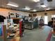 Interior view of the pro shop, featuring merchandise displays and a checkout counter at 5065 Nw 21St Loop, Ocala, FL 34482