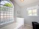Bathroom with large soaking tub and a block window for natural light at 5226 Nw 21St Loop, Ocala, FL 34482