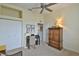 Bright bedroom with built-in shelving and a desk area at 5622 Nw 27Th Pl, Ocala, FL 34482
