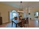 Formal dining room with hardwood floors and a chandelier at 5622 Nw 27Th Pl, Ocala, FL 34482