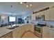 Modern kitchen with stainless steel appliances and granite countertops at 5622 Nw 27Th Pl, Ocala, FL 34482