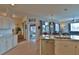 Spacious kitchen with island, stainless steel appliances, and granite countertops at 5622 Nw 27Th Pl, Ocala, FL 34482