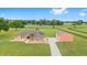 Stunning single-story home with a large metal outbuilding on sprawling acreage in a serene, rural setting at 9901 Nw 6Th Ct, Ocala, FL 34475