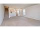 An inviting living room blends seamlessly with the kitchen, featuring stairs to the second floor at 4950 Sw 45Th Cir, Ocala, FL 34474