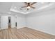 Bedroom with ceiling fan and shiplap accent wall at 8448 Se 161St St, Summerfield, FL 34491