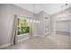 Bright dining area with tiled floors and French doors at 8448 Se 161St St, Summerfield, FL 34491