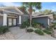 Front entrance with double doors and walkway at 8448 Se 161St St, Summerfield, FL 34491