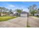 Charming single-story home with an attached two-car garage and a well-manicured lawn at 8448 Se 161St St, Summerfield, FL 34491