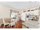 Bright kitchen featuring a dining area and stainless steel appliances at 9464 Se 132Nd Loop, Summerfield, FL 34491