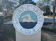 An Aquatic Sports Club sign featuring a swimmer, inviting residents to enjoy community swimming at 10819 Sw 84Th Ter, Ocala, FL 34481