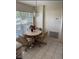 Small breakfast nook with table and chairs near window at 35 Hemlock Terrace Dr, Ocala, FL 34472