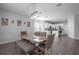 Bright dining room with wooden table and kitchen access at 3921 Sw 51St Ter, Ocala, FL 34474