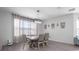 Elegant dining room with a farmhouse style table at 3921 Sw 51St Ter, Ocala, FL 34474