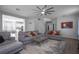 Spacious living room featuring gray sofas and a coffee table at 3921 Sw 51St Ter, Ocala, FL 34474