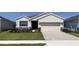 Charming single-Gathering home with a two-car garage, well-maintained lawn, and inviting curb appeal at 4098 Nw 48Th Terrace Rd, Ocala, FL 34482