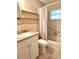 Bathroom with shower/tub combo and updated vanity at 711 Ne 43Rd St, Ocala, FL 34479