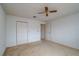 Well-lit bedroom with double door closet and ceiling fan at 8475 Sw 109Th Lane Rd, Ocala, FL 34481