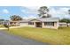 Single story home with well-maintained lawn at 8475 Sw 109Th Lane Rd, Ocala, FL 34481