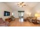 Living room with hardwood floors, comfortable seating and a view to the patio at 8475 Sw 109Th Lane Rd, Ocala, FL 34481