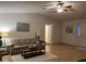 Living room features hardwood floors, comfy seating, and a charming wall decor at 8475 Sw 109Th Lane Rd, Ocala, FL 34481