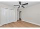 Bright bedroom with hardwood floors and double door closet at 3496 Sw 149Th Ct, Ocala, FL 34481